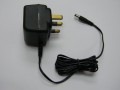 AC-DC Adaptor, Input : AC220V ~ 50Hz UK type, Output : DC9V 300mA, Center Positive 2.1mm (HS Code: 85044099, MADE IN CHINA)
